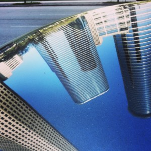 Photo of Houston's Allen Center reflected on my car roof