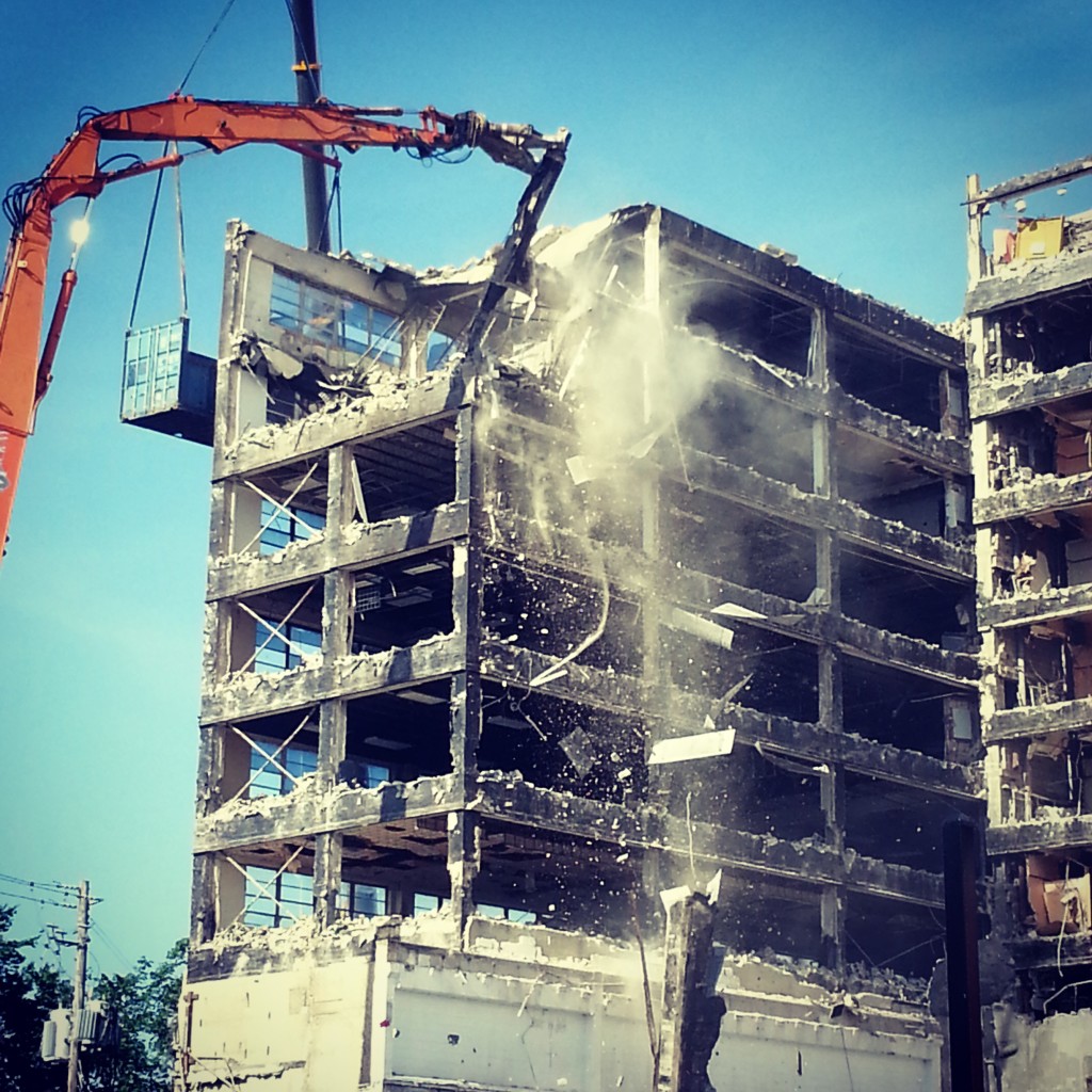 Photo of falling slabs of concrete at demolition of 3400 Montrose, 2014