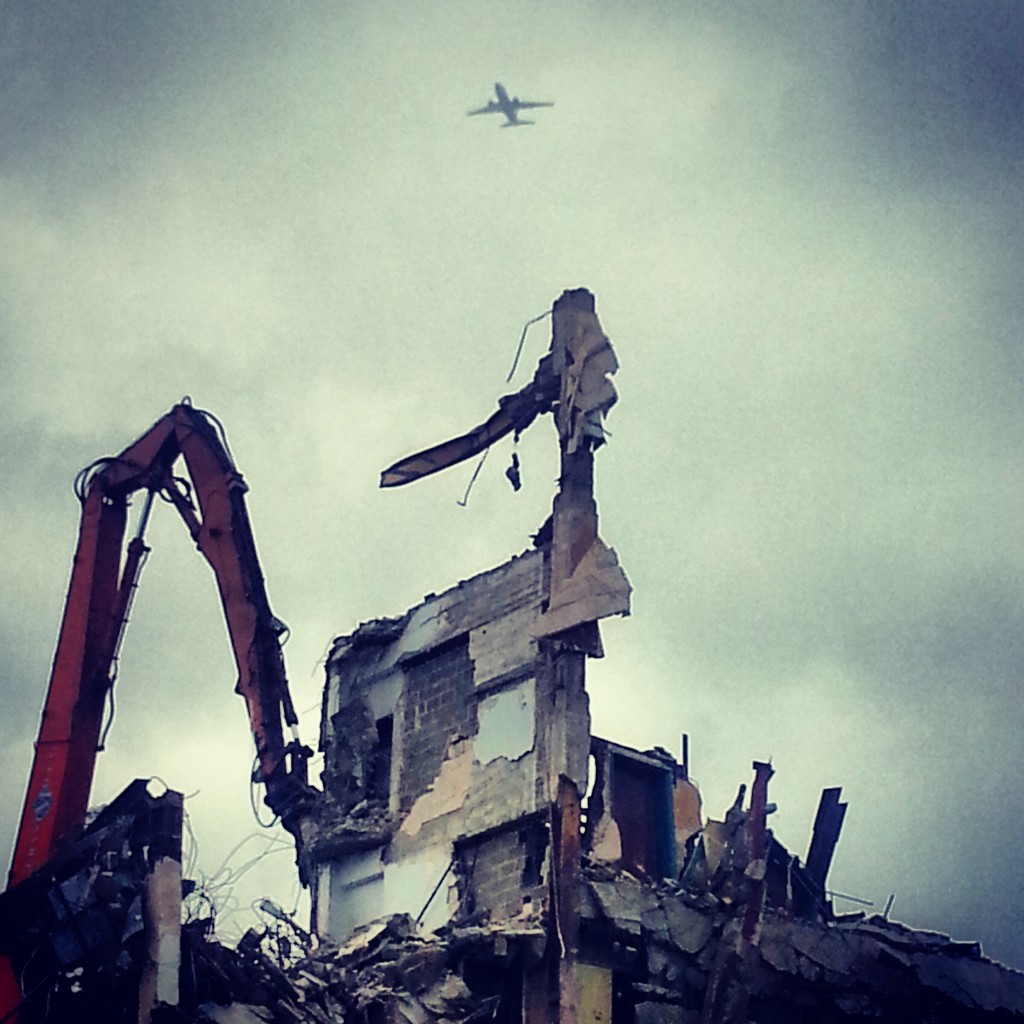 Photo of plane over demolition of 3400 Montrose, 2014